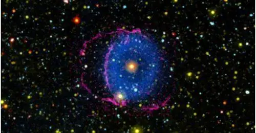 Mystery Solved! The Blue Ring Nebula