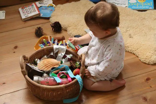 Every Baby Should Have a Treasure Basket – Here's How to Make One | Activities for one year olds, Infant activities, Baby play