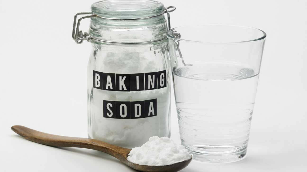 baking-soda-water-and-wooden-spoon-1296x728-1-1389616