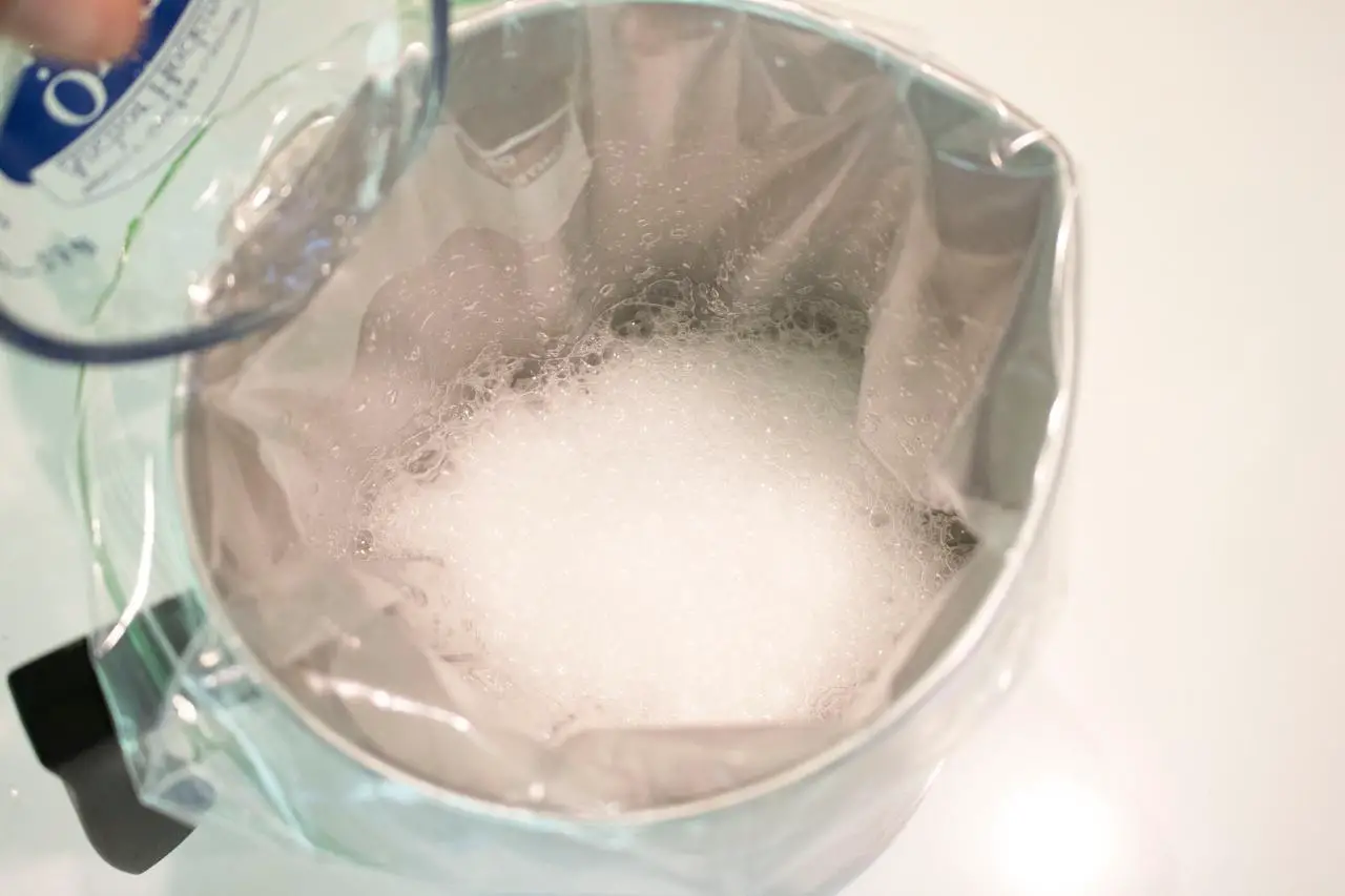how to clean a glass shower head with baking soda