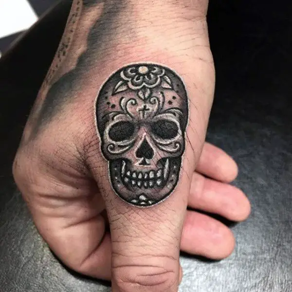 Skull hand tattoo