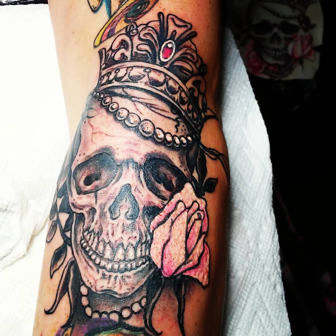 Skull hand tattoo