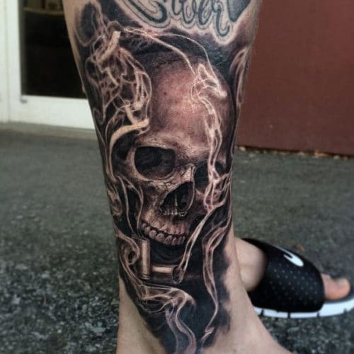Skull hand tattoo
